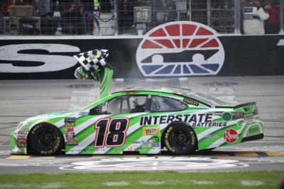 Kyle Busch, driver of the #18 Interstate Batteries Toyota, celebrates winning the Monster Energy NASCAR Cup Series O'Reilly Auto Parts 500 at Texas Motor Speedway on April 8, 2018 in Fort Worth, Texas.